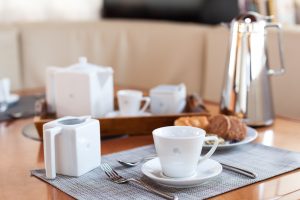 White cup on the table