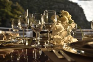 Glasses with Flowers on table